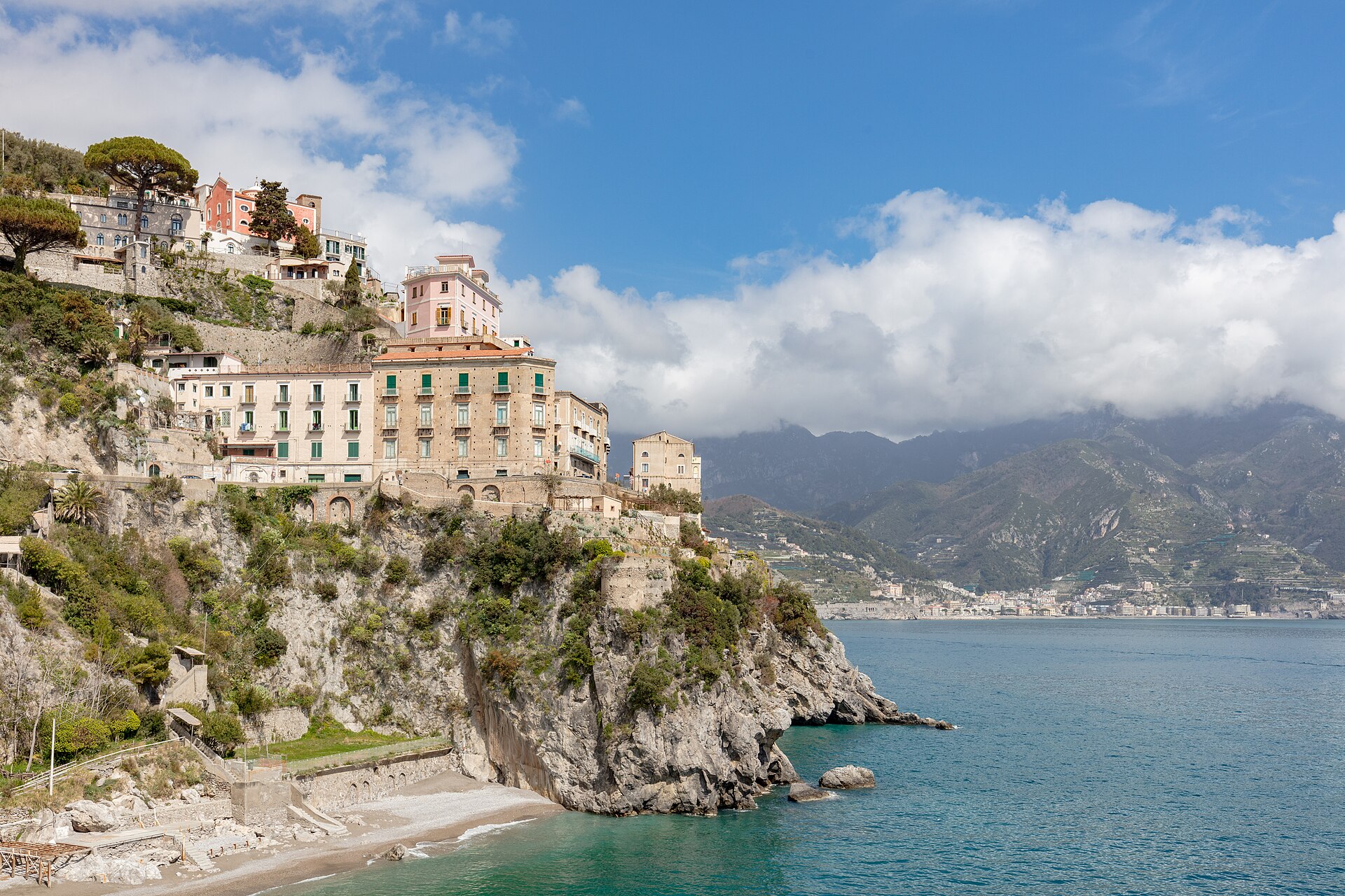 Atrani beach, one of the few genuinely free beaches on the Amalfi Coast, framed by the village's medieval buildings