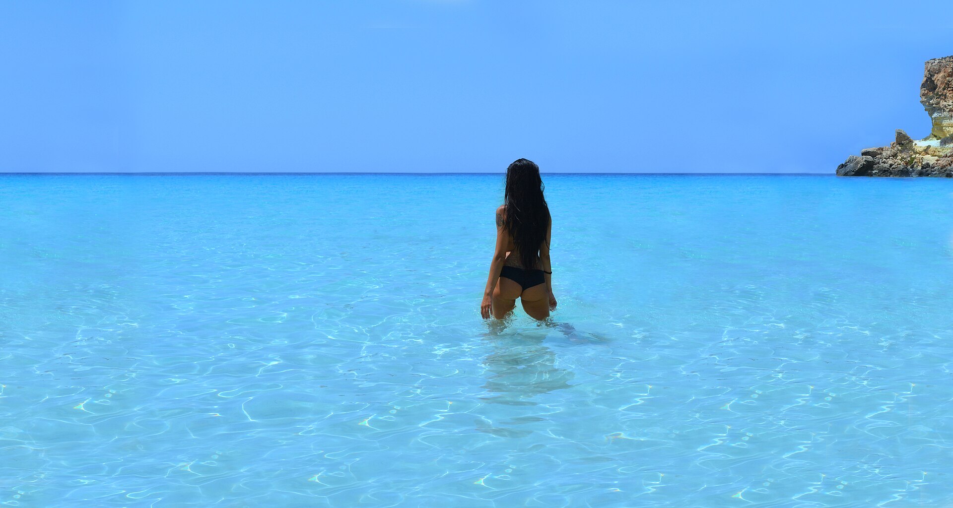 Rabbit Beach on Lampedusa, often called the best of the best beaches in Sicily, with pale sand and clear shallow water