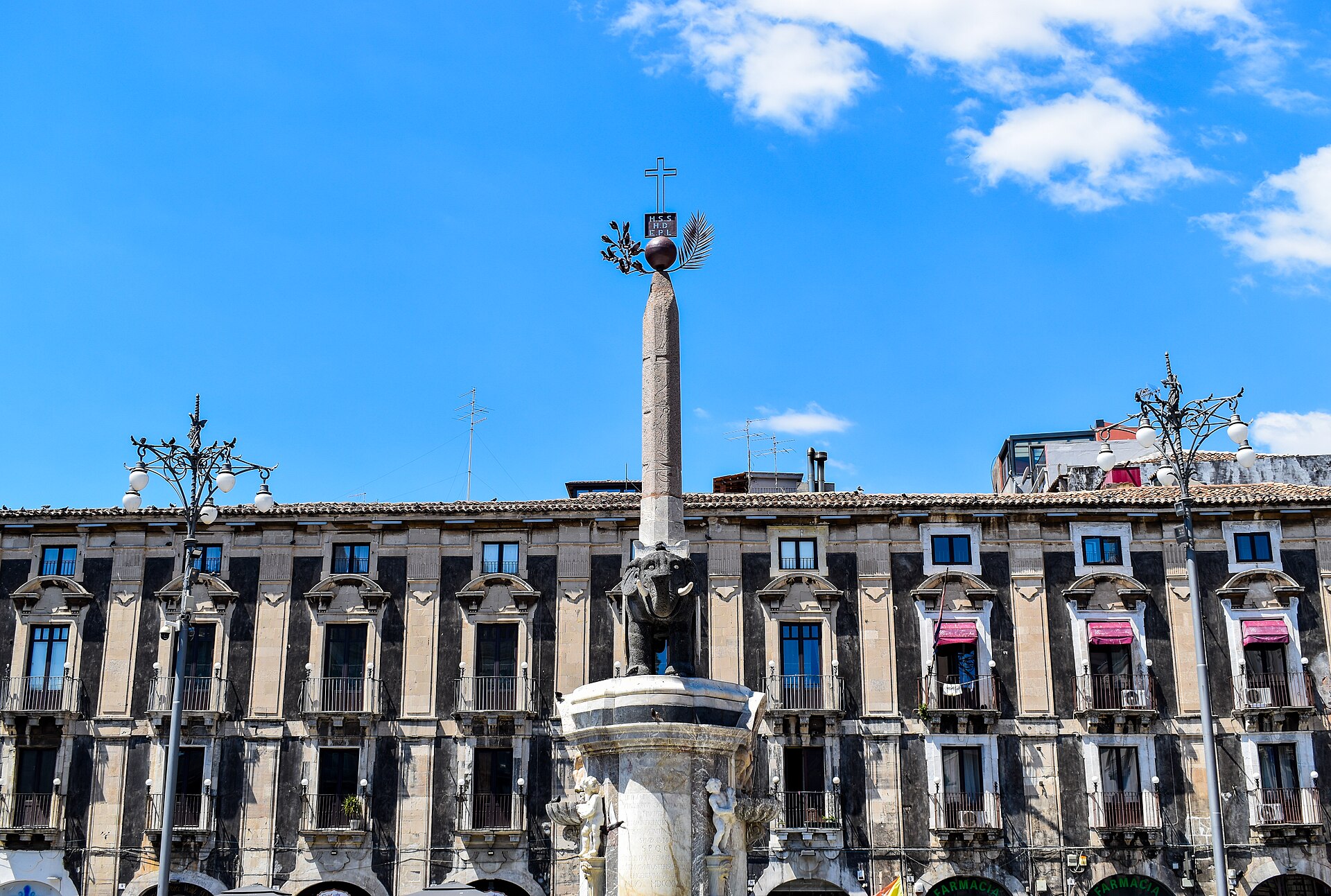 Piazza del Duomo in Catania with the lava-stone Liotru elephant fountain and Baroque buildings in morning light