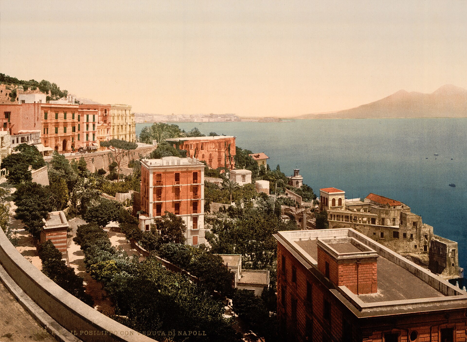 Naples travel guide: the city waterfront with Vesuvius rising behind the Bay of Naples
