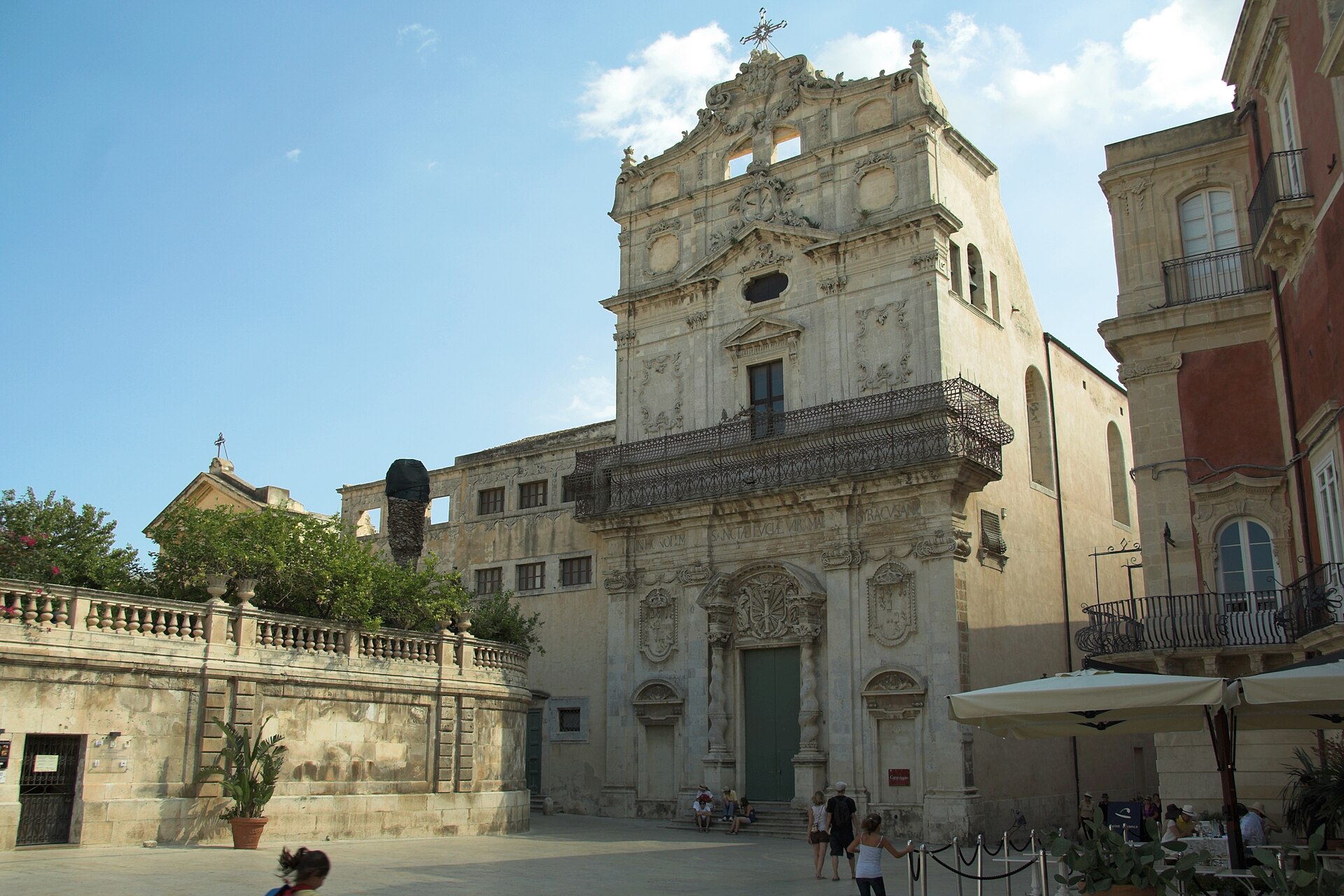 Waterfront stone buildings and the harbor of Ortigia island in Syracuse, a highlight of eastern Sicily