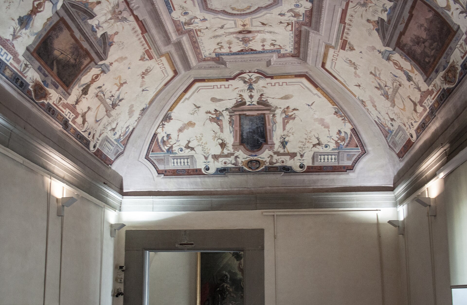 The famous Uffizi Gallery corridor lined with antique sculptures and Old Master paintings