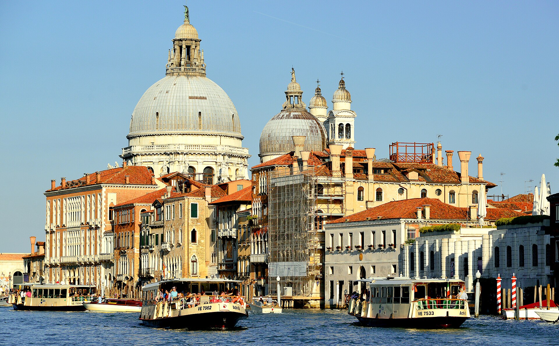 Venice vaporetto water bus approaching a stop on the Grand Canal