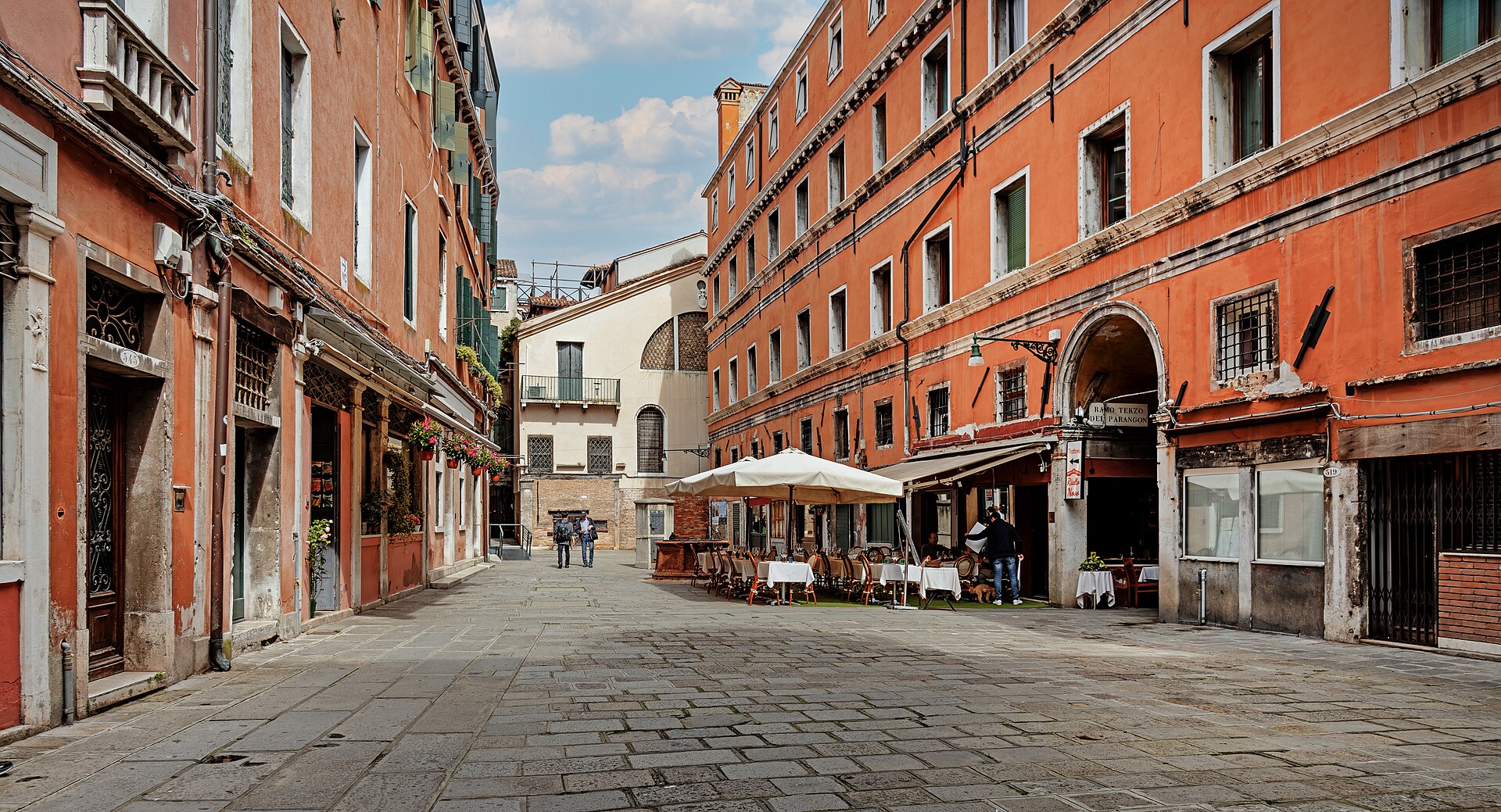 San Polo's Rialto Market is one of the most alive places in Venice — staying nearby means being in it before the crowds arrive.
